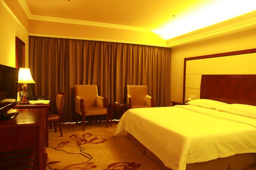 Hotel Vienna Peking Pokoj fotografie
