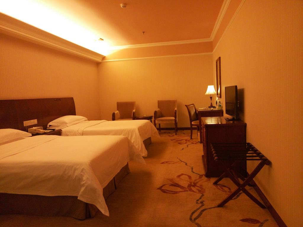 Hotel Vienna Peking Pokoj fotografie